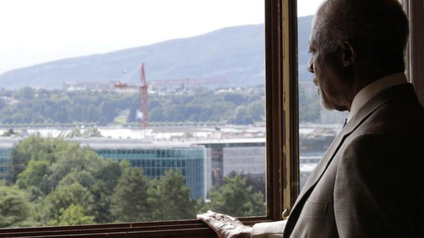 Joint Special Envoy for Syria, Kofi Annan looks out of a window from his office before a meeting with Major-General Robert Mood of Norway at the United Nations in Geneva July 20, 2012. REUTERS/Denis Balibouse (SWITZERLAND - Tags: POLITICS MILITARY)