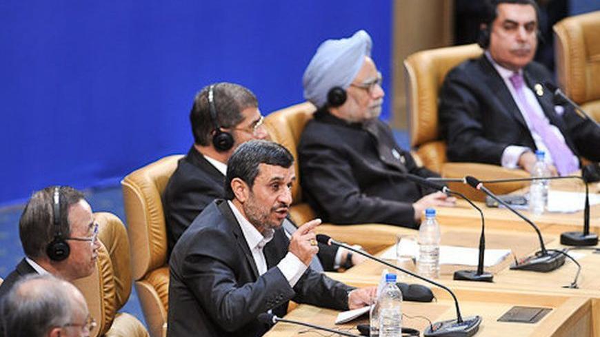 Iranian President Mahmoud Ahmadinejad speaks during the 16th summit of the Non-Aligned Movement in Tehran August 30, 2012. REUTERS/Amir Kholousi/ISNA (IRAN - Tags: POLITICS) FOR EDITORIAL USE ONLY. NOT FOR SALE FOR MARKETING OR ADVERTISING CAMPAIGNS. THIS IMAGE HAS BEEN SUPPLIED BY A THIRD PARTY. IT IS DISTRIBUTED, EXACTLY AS RECEIVED BY REUTERS, AS A SERVICE TO CLIENTS