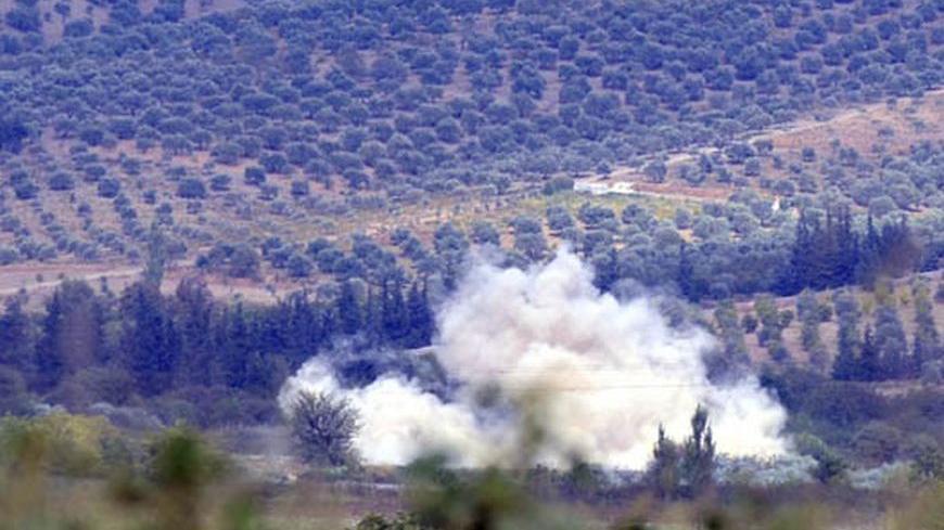 Smoke rises after a mortar bomb fired from Syria landed in Turkish soil on the Turkish-Syrian border in southern Hatay province October 8, 2012. Turkey's military launched a retaliatory strike after Syria fired a mortar bomb into countryside in Turkey's southern province of Hatay on Monday, a Turkish state official told Reuters. It was the sixth consecutive day of Turkish retaliation against bombardment from the Syrian side of the border, where President Bashar al-Assad's forces are battling rebels. REUTERS