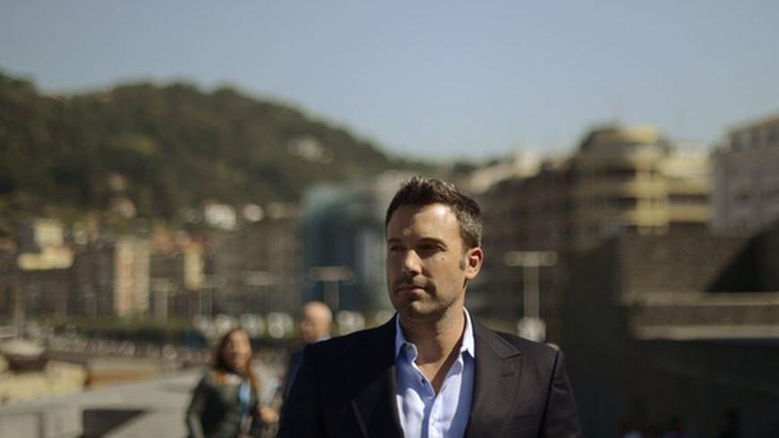 U.S. actor-director Ben Affleck poses during a photocall to promote his film Argo on the second day of the San Sebastian Film Festival September 22, 2012. The film, based on true events at the time of the Iranian hostage crisis, is part of the festival's official selection. REUTERS/Vincent West (SPAIN - Tags: ENTERTAINMENT SOCIETY)