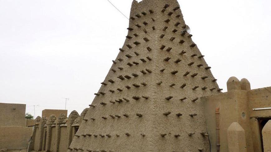 A traditional mud structure stands in the Malian city of Timbuktu May 15, 2012. Al Qaeda-linked Mali Islamists armed with Kalashnikovs and pick-axes began destroying prized mausoleums of saints in the UNESCO-listed northern city of Timbuktu on June 30, 2012 in front of shocked locals, witnesses said. The Islamist Ansar Dine group backs strict sharia, Islamic law, and considers the shrines of the local Sufi version of Islam idolatrous. Sufi shrines have also been attacked by hardline Salafists in Egypt and L
