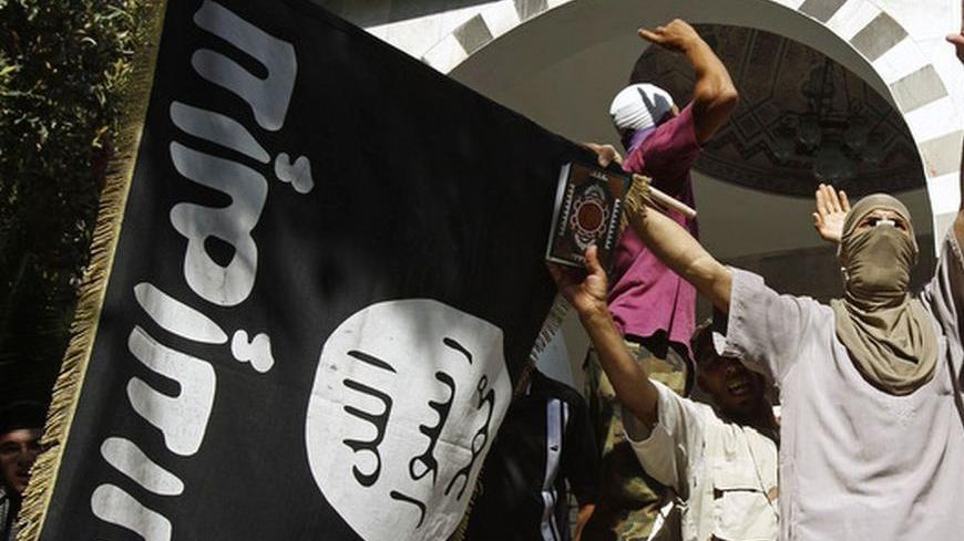 Protesters shout slogans during a demonstration against security forces seeking to arrest Tunisian Salafist leader Saif-Allah Benahssine over clashes at the U.S. Embassy last week, at the al-Fatah mosque in Tunis September 17, 2012. Benahssine, leader of the Tunisian branch of the hardline Islamist Ansar al-Sharia, on Monday escaped from the mosque that had been surrounded by security forces seeking to arrest him over clashes at the U.S. Embassy last week during protests against an anti-Islam film, a Reuter