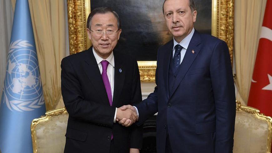 U.N. Secretary-General Ban Ki-moon (L) shakes hands with Turkey's Prime Minister Tayyip Erdogan during their meeting in Ankara December 7, 2012. Ban called on the international community and the U.N. Security Council on Friday to unite and take decisive action to end the conflict in Syria, saying only a political solution could end the violence. REUTERS/Kayhan Ozer/Prime Minister's Press Office/Handout (TURKEY - Tags: POLITICS) FOR EDITORIAL USE ONLY. NOT FOR SALE FOR MARKETING OR ADVERTISING CAMPAIGNS. THI