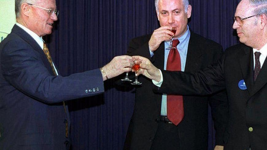 Prime Minister Benjamin Netanyahu (C) joins Efraim Halevy (R) who succeeds outgoing Mossad chief Danny Yatom (L) in a toast in the prime minister's offices during the Mossad handover ceremony April 8. Yatom resigned as Mossad spy chief in February amid scandals over botched missions in Jordan and Switzerland. Halevy, was born in 1934 in Britain and immigrated to Israel during the 1948 Arab-Israeli war that followed the creation of the State of Israel. He served as a former deputy Mossad chief and is expecte