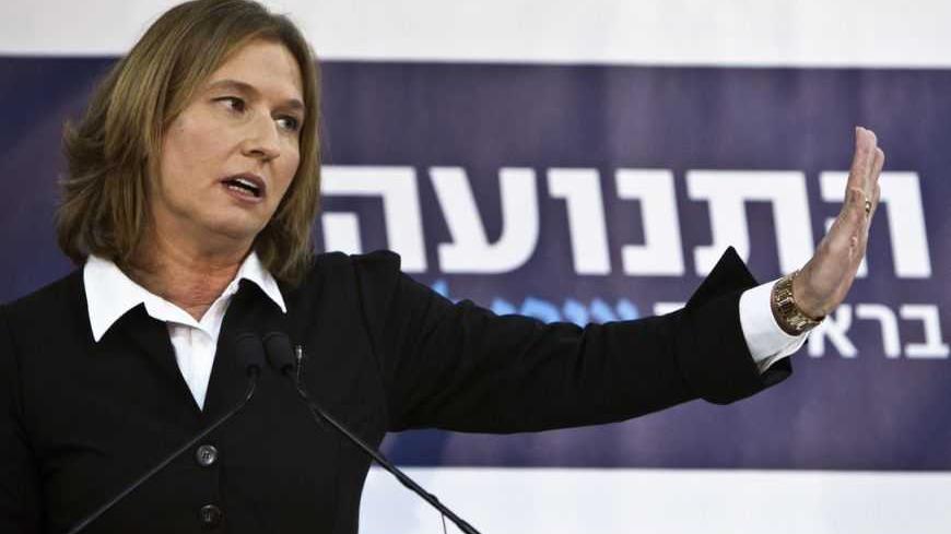 Former centrist Israeli Foreign Minister Tzipi Livni gestures during a news conference in Tel Aviv November 27, 2012. Livni announced on Tuesday she would challenge Prime Minister Benjamin Netanyahu in a Jan. 22 election by running for office as head of a new political party she vowed would "fight for peace."    REUTERS/Nir Elias (ISRAEL - Tags: POLITICS ELECTIONS)