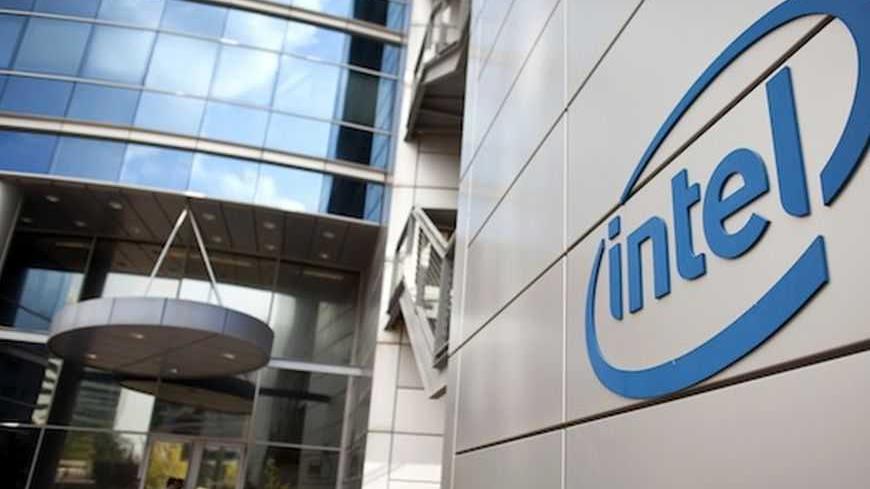 An Intel logo is seen at the company's offices in Petah Tikva, near Tel Aviv October 24, 2011. REUTERS/Nir Elias (ISRAEL - Tags: BUSINESS SCIENCE TECHNOLOGY LOGO) - RTR2T4QI