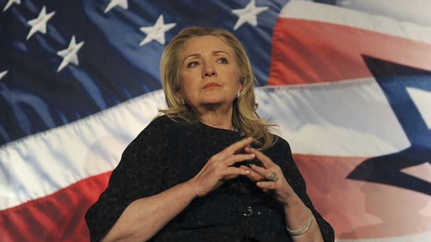 U.S. Secretary of State Hillary Clinton answers questions from the audience at the 2012 Saban Forum on U.S.-Israel relations gala dinner in Washington, November 30, 2012.  REUTERS/Mary F. Calvert (UNITED STATES - Tags: POLITICS)