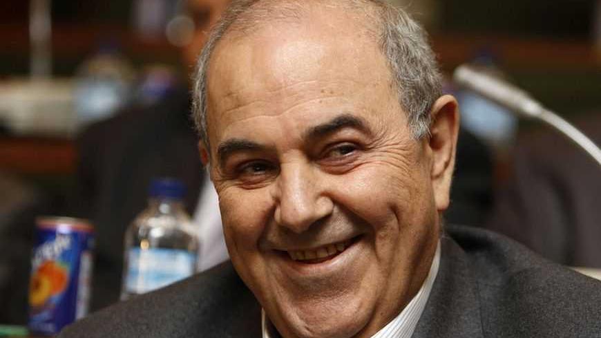 Head of the Sunni-backed Iraqiya political bloc Iyad Allawi sits during a meeting for the main Sunni-backed bloc in Baghdad January 29, 2012.  Iraq's Sunni-backed Iraqiya political bloc will end a boycott of the parliament, a spokeswoman said on Sunday, easing the worst political crisis in Shi'ite Prime Minister Nuri al-Maliki's power-sharing government in a year.   REUTERS/Saad Shalash (IRAQ - Tags: POLITICS HEADSHOT) - RTR2X1PZ