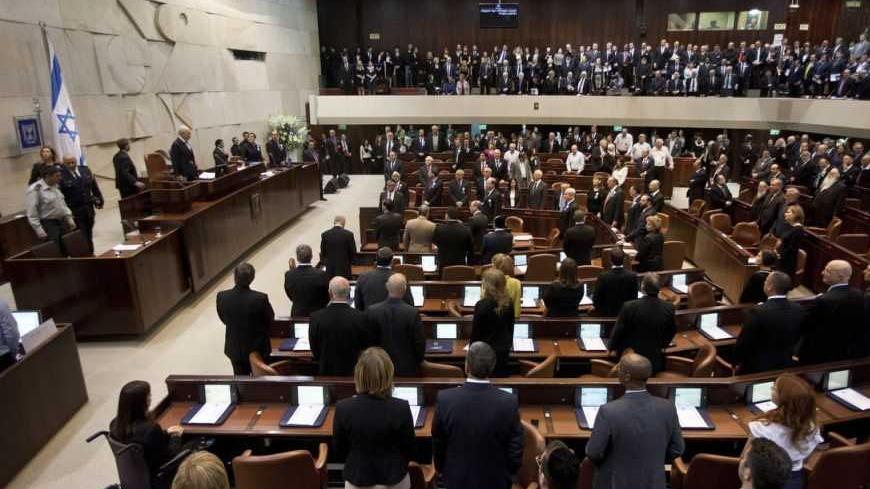 Members of the 19th Knesset, the new Israeli parliament, stand as President Shimon Peres arrives to their swearing-in ceremony in Jerusalem February 5, 2013. REUTERS/Uriel Sinai/Pool (JERUSALEM - Tags: POLITICS) - RTR3DDXN
