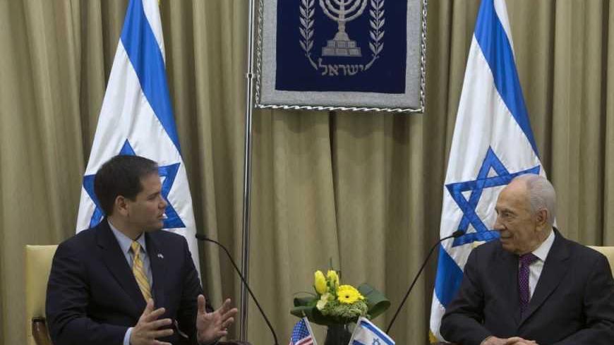 Israel's President Shimon Peres (R) meets with U.S. Senator Marco Rubio (R-FL) in Jerusalem February 20, 2013. REUTERS/Ronen Zvulun (JERUSALEM - Tags: POLITICS) - RTR3E1ET