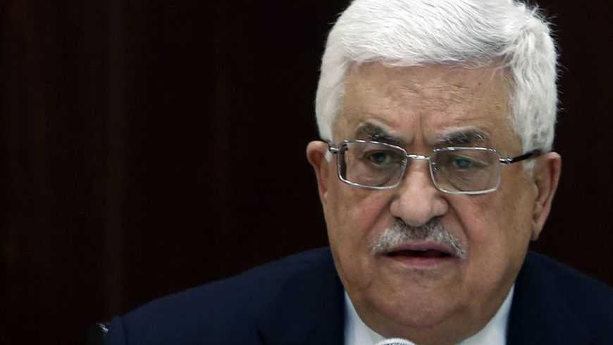Palestinian President Mahmoud Abbas attends a Palestinian Liberation Organization (PLO) executive committee meeting in the West Bank city of Ramallah February 26, 2013. REUTERS/Mohamad Torokman (WEST BANK - Tags: POLITICS) - RTR3EAX8