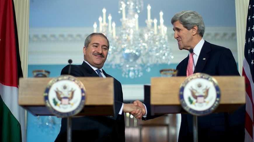WASHINGTON, DC - FEBRUARY 13:  U.S. Secretary of State John Kerry (R) and Jordanian Foreign Minister Nasser Judeh shake hands during a joint press conference at the State Department February 13, 2013 in Washington, DC. Kerry and Judeh met privately to discuss efforts in Syria and on the Middle East peace process among other issues.  (Photo by Win McNamee/Getty Images)