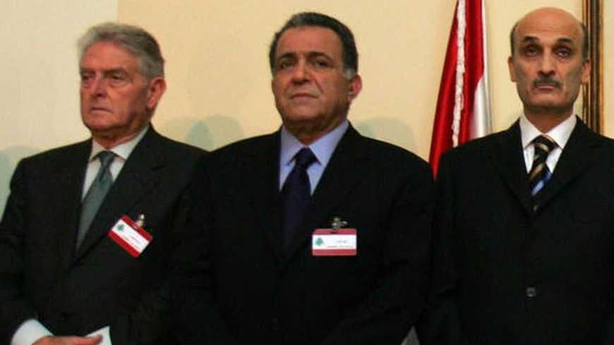 Lebanese Christian leaders and members of the ruling majority stand during a minute of silence in memory of slain Lebanese army general Francois El Hajj, at the Kataeb party headquarters in Beirut 12 December 2007. Hajj and his bodyguard were killed today in a car bomb that also injured eight others in a Christian suburb on the outskirts of Beirut. L-R: National Liberal Party's Dory Chamoun, deputy parliament speaker Farid Makari, Lebanese Forces party leader Samir Geagea, former Lebanese president Amine Ge