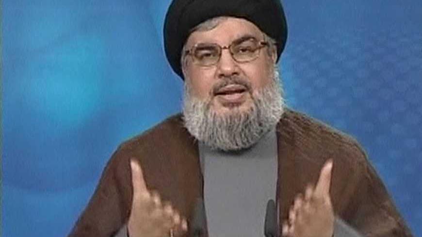 Hezbollah leader Sayyed Hassan Nasrallah gestures as he speaks during a live broadcast in this still image taken from video, June 24, 2011. Nasrallah said on Friday the group had captured three spies among its members, two of whom were recruited by the U.S. Central Intelligence Agency.
      REUTERS/Manar TV via Reuters Tv    (LEBANON - Tags: POLITICS PROFILE) - RTR2O2AL