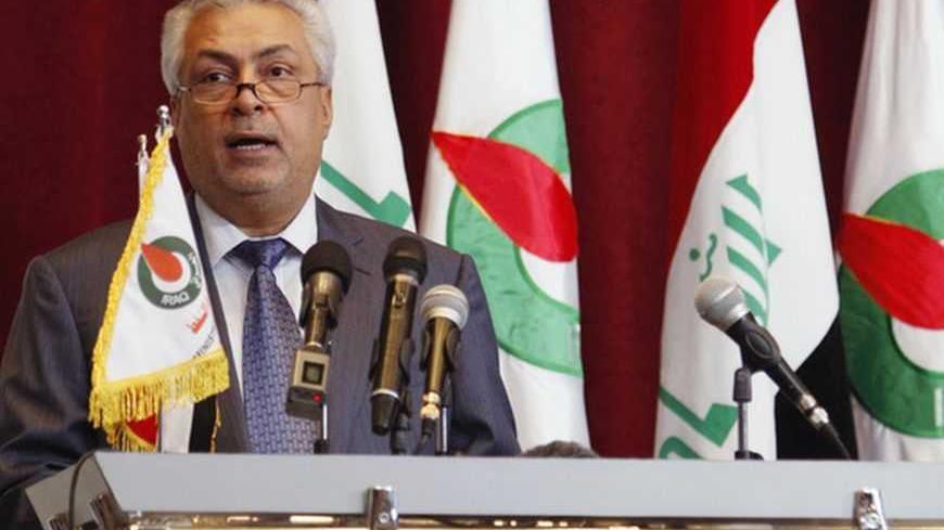 Iraq Oil Minister Abdul Kareem Luaibi addresses a news conference during the fourth licensing round for exploration blocks at the Oil Ministry's headquarters in Baghdad May 30, 2012. A consortium led by Kuwait Energy and partners Turkey's TPAO and Dubai-based Dragon Oil secured a deal to explore Block 9, a mainly oil area in southern Basra province. REUTERS/Saad Shalash (IRAQ - Tags: BUSINESS POLITICS ENERGY) - RTR32THT