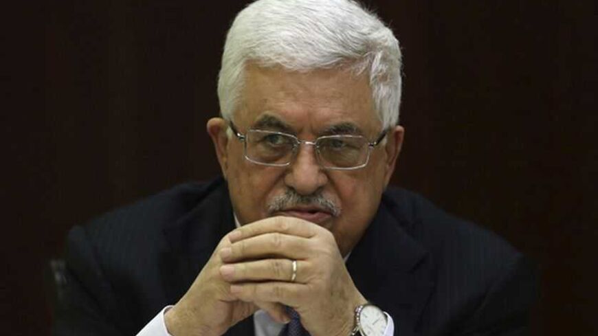 Palestinian President Mahmoud Abbas attends a Palestinian Liberation Organization (PLO) executive committee meeting in the West Bank city of Ramallah January 29, 2013. REUTERS/Mohamad Torokman (WEST BANK - Tags: POLITICS) - RTR3D4HR