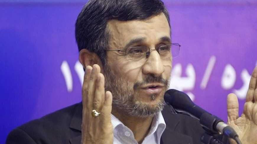 Iran's President Mahmoud Ahmadinejad talks during a news conference at the end of his visit to Cairo, February 7, 2013. REUTERS/Asmaa Waguih (EGYPT - Tags: POLITICS) - RTR3DGQ9