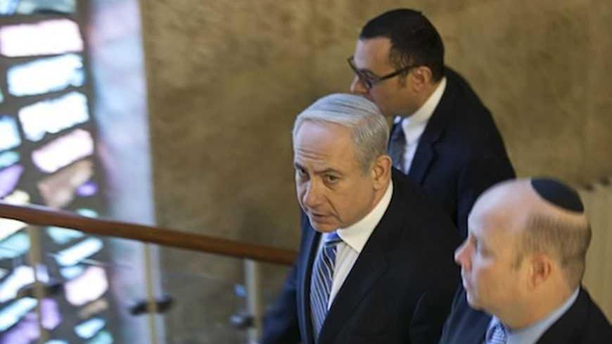 Israel's Prime Minister Benjamin Netanyahu (L) arrives for the weekly cabinet meeting in Jerusalem February 10, 2013. Iran's nuclear ambitions, the civil war in Syria and stalled Israeli-Palestinian peace efforts will top the agenda of U.S. President Barack Obama's visit to Israel, Netanyahu said on Sunday. REUTERS/Uriel Sinai/Pool (JERUSALEM - Tags: POLITICS) - RTR3DKO7