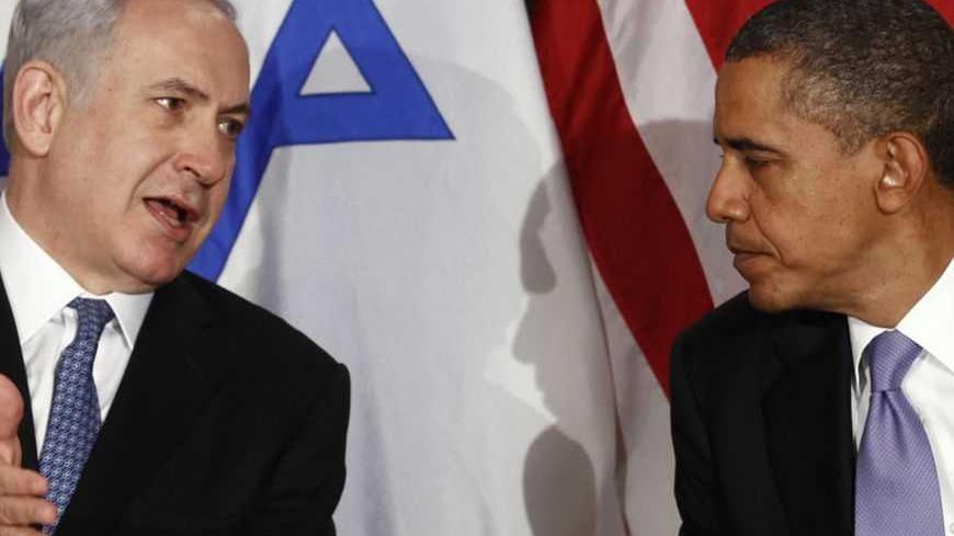 U.S. President Barack Obama shakes hands with Israeli Prime Minister Benjamin Netanyahu at the United Nations in New York September 21, 2011.     REUTERS/Kevin Lamarque  (UNITED STATES - Tags: POLITICS) - RTR2RMJ9