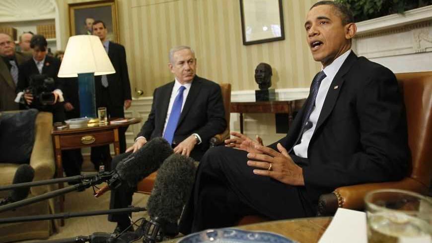 U.S. President Barack Obama speaks to the media alongside Israel's Prime Minister Benjamin Netanyahu during their meeting in the Oval Office of the White House in Washington, March 5, 2012.   REUTERS/Jason Reed   (UNITED STATES - Tags: POLITICS) - RTR2YVOP