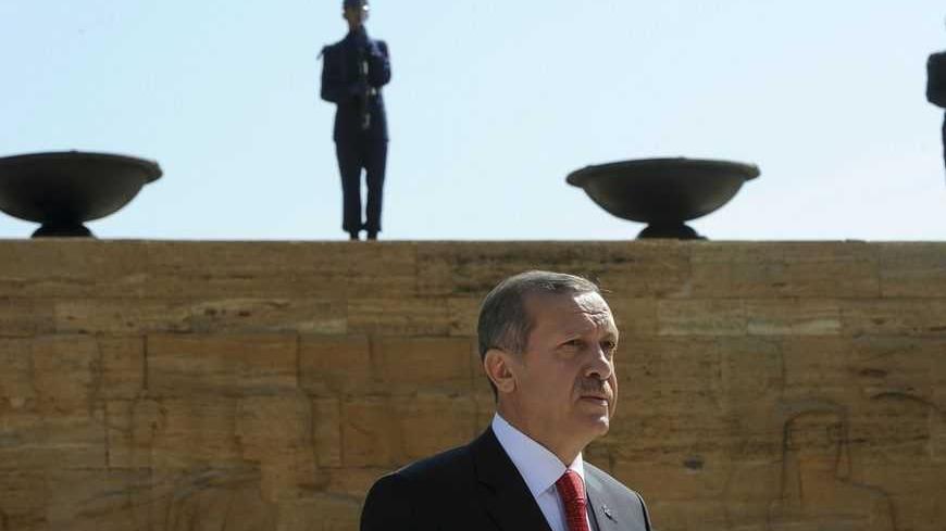 Turkey's Prime Minister Tayyip Erdogan leaves a wreath-laying ceremony at the mausoleum of Mustafa Kemal Ataturk, founder of modern Turkey, in Ankara August 1, 2012. REUTERS/Stringer (TURKEY - Tags: POLITICS MILITARY) - RTR35TGQ