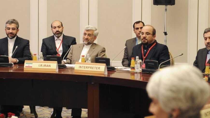 Members of the Iranian delegation, led by Supreme National Security Council Secretary and chief nuclear negotiator Saeed Jalili (3rd L), sit at a table during talks in Almaty February 26, 2013. World powers began talks with Iran on its nuclear programme in the Kazakh city of Almaty on Tuesday, in a fresh attempt to resolve a decade-old standoff that threatens the Middle East with a new war. REUTERS/Ilyas Omarov/Pool  (KAZAKHSTAN - Tags: POLITICS ENERGY) - RTR3EAS0