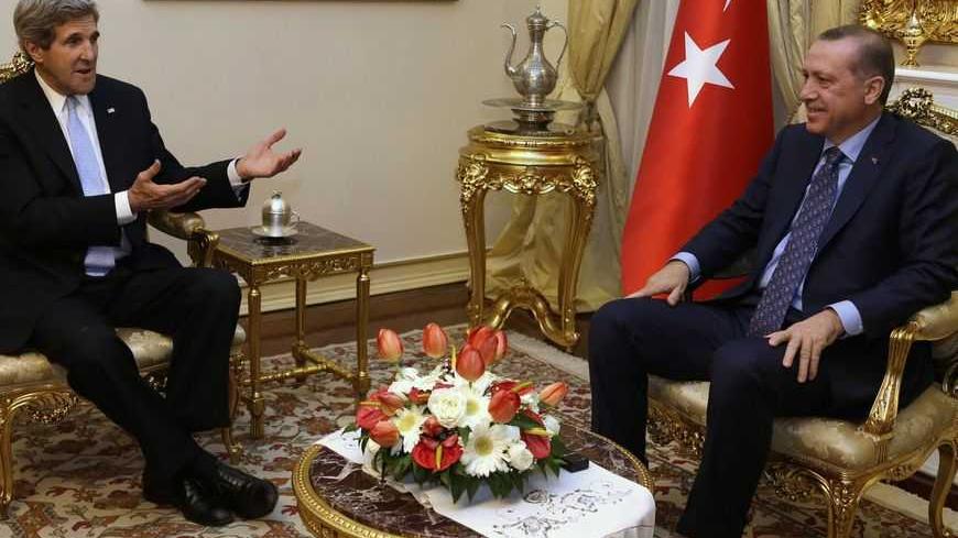 U.S. Secretary of State John Kerry (L) meets with Turkish Prime Minister Tayyip Erdogan at Ankara Palace in Ankara, March 1, 2013. Kerry said on Friday the United States found a comment by Turkey's prime minister, likening Zionism to crimes against humanity, "objectionable", overshadowing their talks on the crisis in neighbouring Syria. REUTERS/Jacquelyn Martin/Pool (TURKEY - Tags: POLITICS) - RTR3EG91