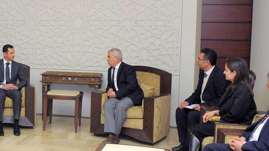 Syria's President Bashar al-Assad (3rd L) meets a Turkish parliamentary delegation headed by Hasan Akgol (4th R) in Damascus in this March 7, 2013 handout photo released by Syria's national news agency SANA. REUTERS/SANA (SYRIA - Tags: POLITICS CIVIL UNREST CONFLICT) 

ATTENTION EDITORS - THIS PICTURE WAS PROVIDED BY A THIRD PARTY. REUTERS IS UNABLE TO INDEPENDENTLY VERIFY THE AUTHENTICITY, CONTENT, LOCATION OR DATE OF THIS IMAGE. FOR EDITORIAL USE ONLY. NOT FOR SALE FOR MARKETING OR ADVERTISING CAMPAIGNS