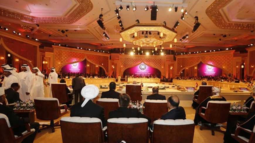 Leaders from Arab states are seen attending the opening of the Arab League summit in Doha March 26, 2013. A summit of Arab heads of state opened in the Qatari capital Doha on Tuesday expected to focus on the war in Syria as well as on the Israeli-Palestinian conflict.  REUTERS/Ahmed Jadallah (QATAR - Tags: POLITICS) - RTXXXR4