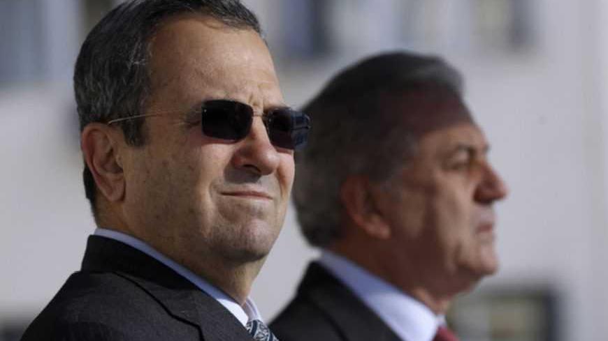 Israel's Defence Minister Ehud Barak (L) and his Greek counterpart Dimitris Avramopoulos watch a military parade at the Defence Ministry in Athens January 10, 2012. REUTERS/Yiorgos Karahalis (GREECE - Tags: POLITICS MILITARY) - RTR2W3DY