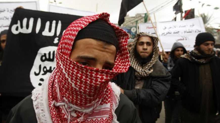 A Palestinian Salafist takes part in a protest against Syria's President Bashar al-Assad in Rafah in the southern Gaza Strip February 24, 2012. REUTERS/ Ibraheem Abu Mustafa (GAZA - Tags: POLITICS CIVIL UNREST) - RTR2YDFU
