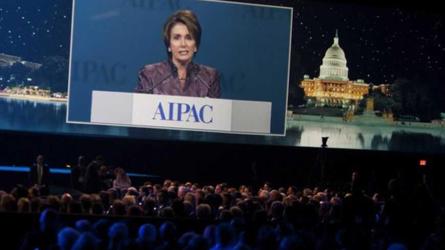 U.S. House Minority Leader Nancy Pelosi (D-CA) is shown on a monitor speaking to the American Israel Public Affairs Committee (AIPAC) policy conference in Washington on March 5, 2012.      REUTERS/Joshua Roberts    (UNITED STATES - Tags: POLITICS) - RTR2YWCN