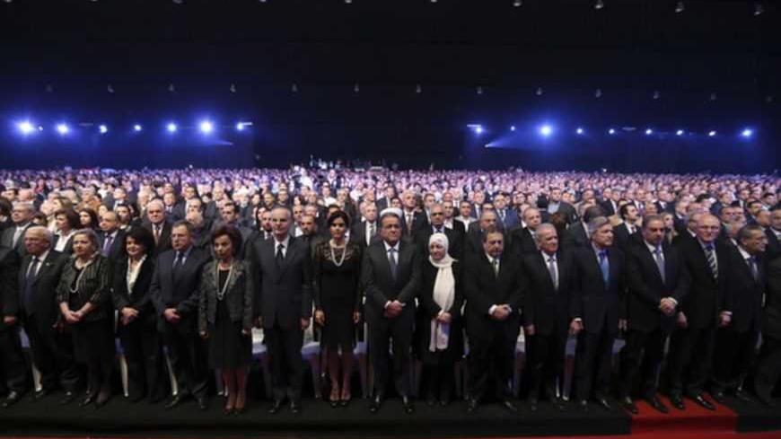 Lebanese leaders and members of the "14 March Alliance", politicians and supporters of former Lebanese Prime Minister Saad al-Hariri stand during a ceremony commemorating the eighth anniversary of the assassination of his father, former Prime Minister Rafik al-Hariri, in Beirut February 14, 2013. REUTERS/Mohamed Azakir (LEBANON - Tags: POLITICS ANNIVERSARY) - RTR3DSMS