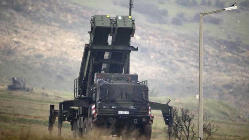 Patriot missile installation is pictured at a positions near the city of Kahramanmaras, February 23, 2013. Germany's defence minister inspected Patriot missile batteries close to the Syria-Turkey border on Saturday and said they delivered a "clear warning" to Damascus that NATO would not tolerate missiles being fired into Turkey. Thomas de Maiziere and his Dutch counterpart Jeanine Hennis-Plasschaert travelled to the Turkish cities of Adana and Kahramanmaras to inspect the batteries provided by their countr