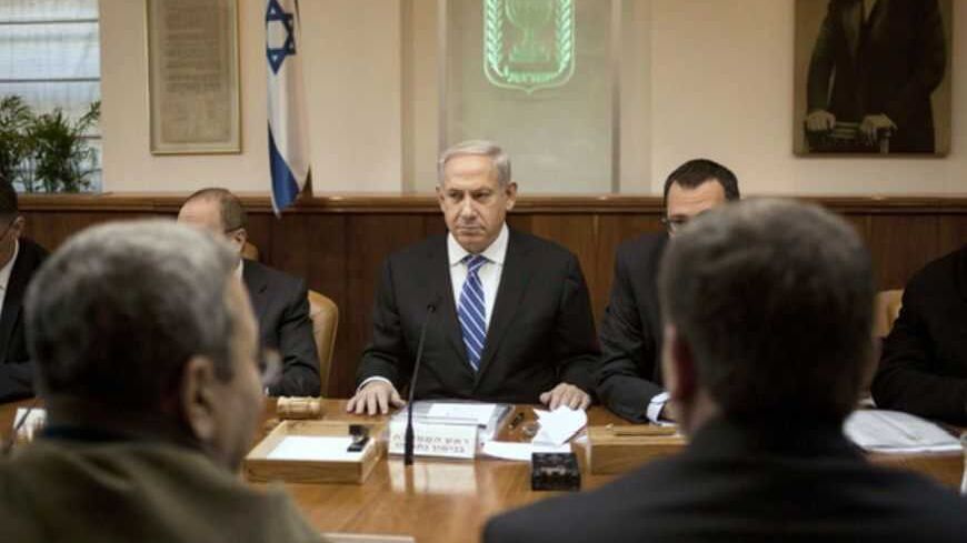 Israel's Prime Minister Benjamin Netanyahu (C) attends the weekly cabinet meeting in Jerusalem March 10, 2013. Netanyahu on Sunday convened his outgoing cabinet for probably the last time, he said, increasing speculation that he will complete forming a new administration within days. REUTERS/Sebastian Scheiner/Pool (JERUSALEM - Tags: POLITICS) - RTR3ESZR