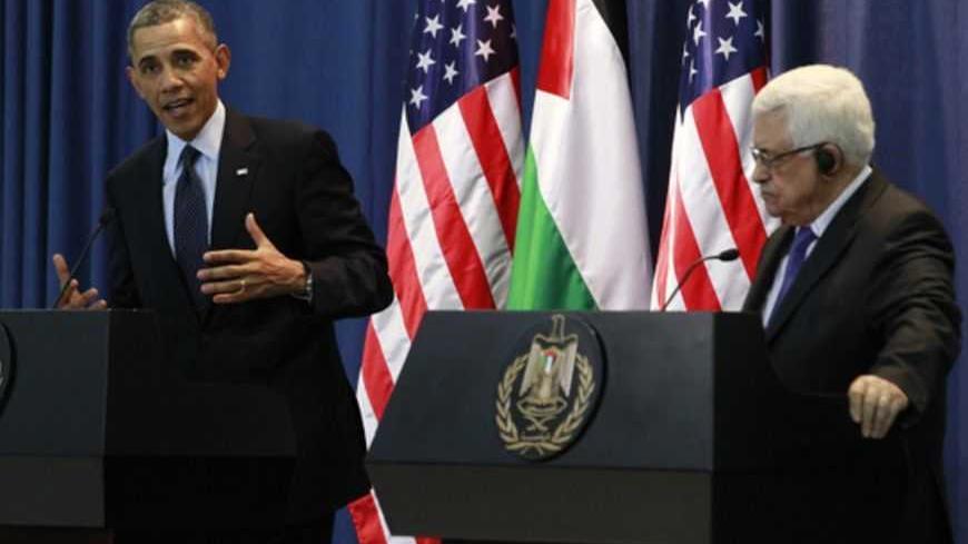 U.S. President Barack Obama participates in a joint news conference with Palestinian President Mahmoud Abbas at the Muqata Presidential Compound in Ramallah March 21, 2013.   REUTERS/Jason Reed   (WEST BANK - Tags: POLITICS) - RTR3F9UB