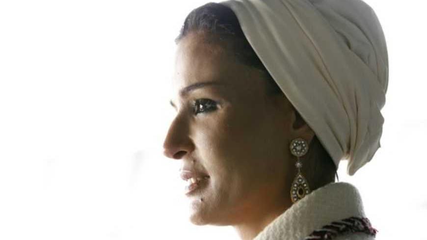 Sheikha Mozah bint Nasser Al Missned, wife of Qatar's Emir Sheikh Hamad bin Khalifa al Thani, arrives at the Olympic Stadium during a state visit in east London October 27, 2010. REUTERS/Suzanne Plunkett (BRITAIN - Tags: SPORT POLITICS OLYMPICS PROFILE ROYALS) - RTXTW4C