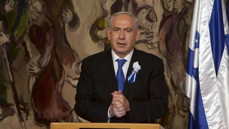 Israel's Prime Minister Benjamin Netanyahu speaks at a reception following the swearing-in ceremony of the 19th Knesset, the new Israeli parliament, in Jerusalem February 5, 2013. REUTERS/Ronen Zvulun (JERUSALEM - Tags: POLITICS) - RTR3DE06