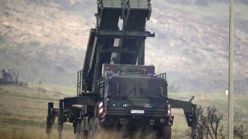 Patriot missile installation is pictured at a positions near the city of Kahramanmaras, February 23, 2013. Germany's defence minister inspected Patriot missile batteries close to the Syria-Turkey border on Saturday and said they delivered a "clear warning" to Damascus that NATO would not tolerate missiles being fired into Turkey. Thomas de Maiziere and his Dutch counterpart Jeanine Hennis-Plasschaert travelled to the Turkish cities of Adana and Kahramanmaras to inspect the batteries provided by their countr