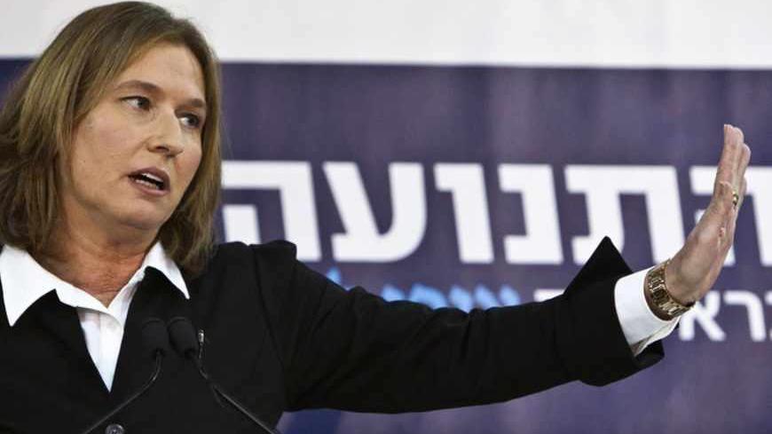 Former centrist Israeli Foreign Minister Tzipi Livni gestures during a news conference in Tel Aviv November 27, 2012. Livni announced on Tuesday she would challenge Prime Minister Benjamin Netanyahu in a Jan. 22 election by running for office as head of a new political party she vowed would "fight for peace."    REUTERS/Nir Elias (ISRAEL - Tags: POLITICS ELECTIONS) - RTR3AXEZ