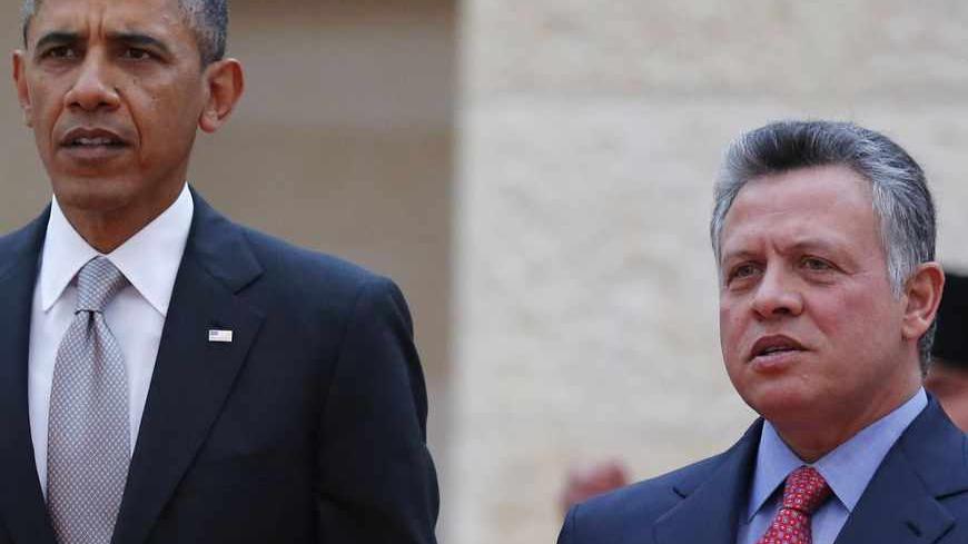 U.S. President Barack Obama walks with Jordan's King Abdullah II to a ceremony at Al Hummar Palace in Amman March 22, 2013.    REUTERS/Larry Downing  (JORDAN - Tags: POLITICS) - RTR3FC1J