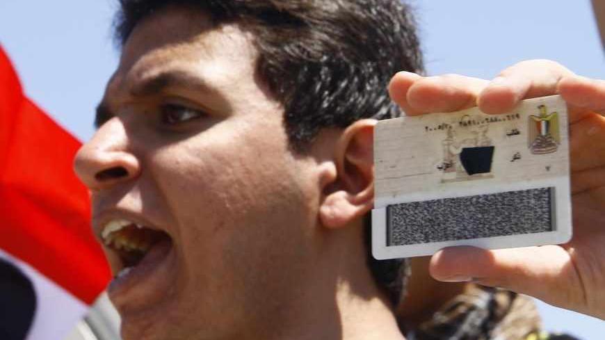 Alexandria-protester-with-blacked-out-ID.jpg