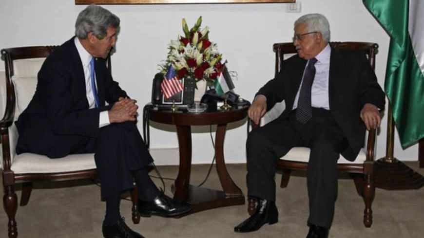 Palestinian President Mahmoud Abbas (R) meets with U.S. Secretary of State John Kerry in the West Bank city of Ramallah April 7, 2013.
   REUTERS/Mohamed Torokman (WEST BANK - Tags: POLITICS) - RTXYC4Z