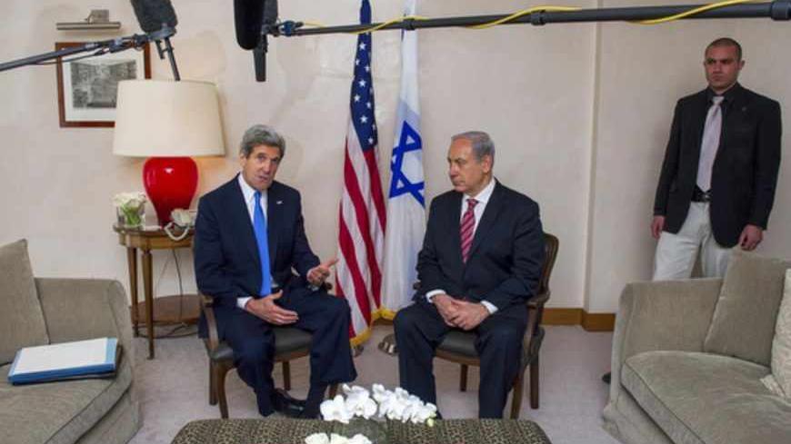 U.S. Secretary of State John Kerry (L) speaks during his meeting with Israel's Prime Minister Benjamin Netanyahu in Jerusalem April 9, 2013. REUTERS/Paul J. Richards/Pool (JERUSALEM - Tags: POLITICS) - RTXYEIP
