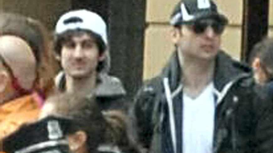 Suspects wanted for questioning in relation to the Boston Marathon bombing April 15 are seen in handout photo released through the FBI website, April 18, 2013. REUTERS/FBI/Handout (UNITED STATES - Tags: CRIME LAW TPX IMAGES OF THE DAY) ATTENTION EDITORS - FOR EDITORIAL USE ONLY. NOT FOR SALE FOR MARKETING OR ADVERTISING CAMPAIGNS. THIS IMAGE HAS BEEN SUPPLIED BY A THIRD PARTY. IT IS DISTRIBUTED, EXACTLY AS RECEIVED BY REUTERS, AS A SERVICE TO CLIENTS - RTXYRPW