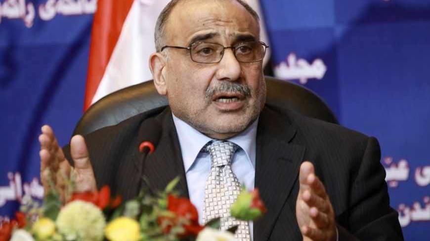 Iraq's Shi'ite Vice President Adel Abdul-Mahdi speaks during a news conference at the Iraqi parliament headquarters in Baghdad September 7, 2010. Abdul-Mahdi thanked the Iraqi National Alliance for choosing him as a prime minister candidate, six months after a general election that produced no clear winner.  REUTERS/Thaier al-Sudani (IRAQ - Tags: POLITICS) - RTR2I0GN