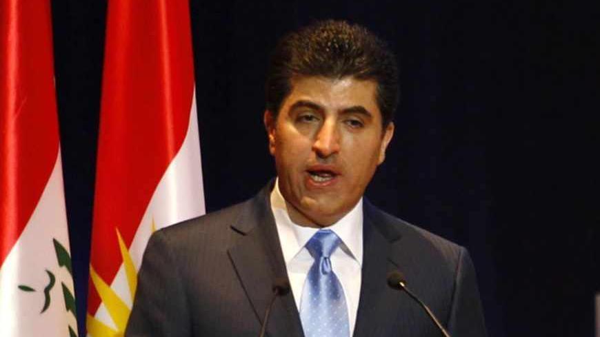 Kurdish Prime Minister Nechirvan Barzani speaks during the first International Energy Arena in Arbil, about 350 km (217 miles) north of Baghdad, May 20, 2012. Iraq's autonomous Kurdistan region expects to start exporting oil from its fields along a new pipeline to the Turkish border when the line is complete in August 2013, the region's natural resources minister Ashti Hawrami said on Sunday.   REUTERS/Thaier al-Sudani (IRAQ - Tags : - Tags: ENERGY POLITICS) - RTR32CEM
