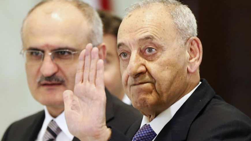 Lebanon's Parliament Speaker Nabih Berri (R) gestures at the presidential palace in Baabda, near Beirut April 5, 2013. Shi'ite militant group Hezbollah, its allies and pro-Western rivals on Friday backed Sunni politician Tammam Salam to be Lebanon's new prime minister, handing him an overwhelming parliamentary endorsement to form a government. REUTERS/Mohamed Azakir (LEBANON - Tags: POLITICS) - RTXY9TC