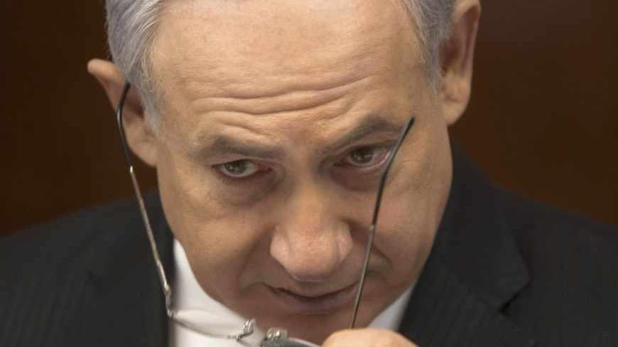 Israel's Prime Minister Benjamin Netanyahu attends the weekly cabinet meeting in Jerusalem April 28, 2013. REUTERS/Sebastian Scheiner/Pool (JERUSALEM - Tags: POLITICS) - RTXZ2HB