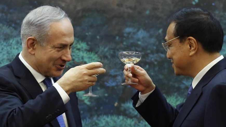 China's Premier Li Keqiang (R) toasts with Israel's Prime Minister Benjamin Netanyahu (2nd R) during a signing ceremony at the Great Hall of the People in Beijing, May 8, 2013. REUTERS/Kim Kyung-Hoon (CHINA - Tags: POLITICS) - RTXZEQB